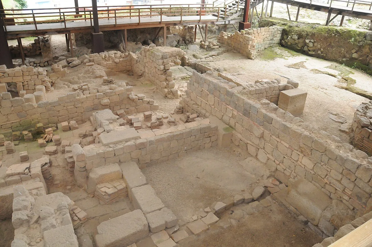 Excavated stone walls of the Roman baths at Alto da Cividade in Braga.