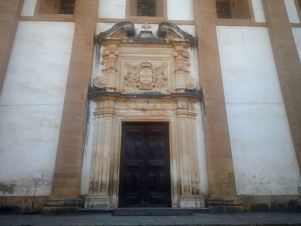 The carved stone doorway of the Mosteiro de Santa Clara-a-Nova in Coimbra.