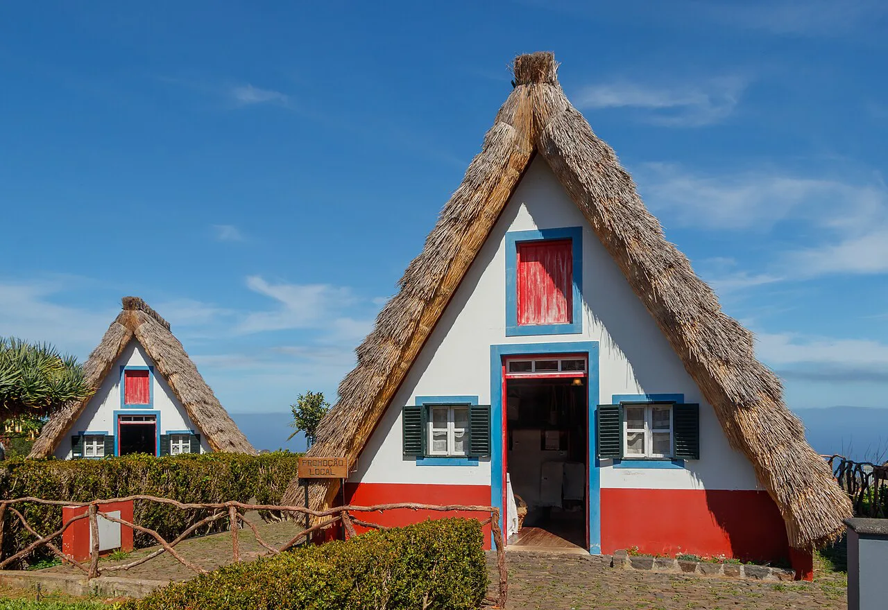 Traditional thatched A-frame houses in Santana, Madeira.