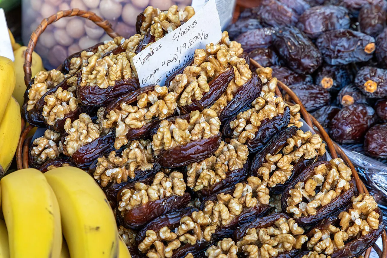 Walnuts, dates and bananas on sale at the Mercado dos Lavradores in Funchal.