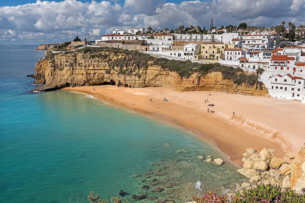 Praia do Carvoeiro and the white houses of Carvoeiro in the Algarve.