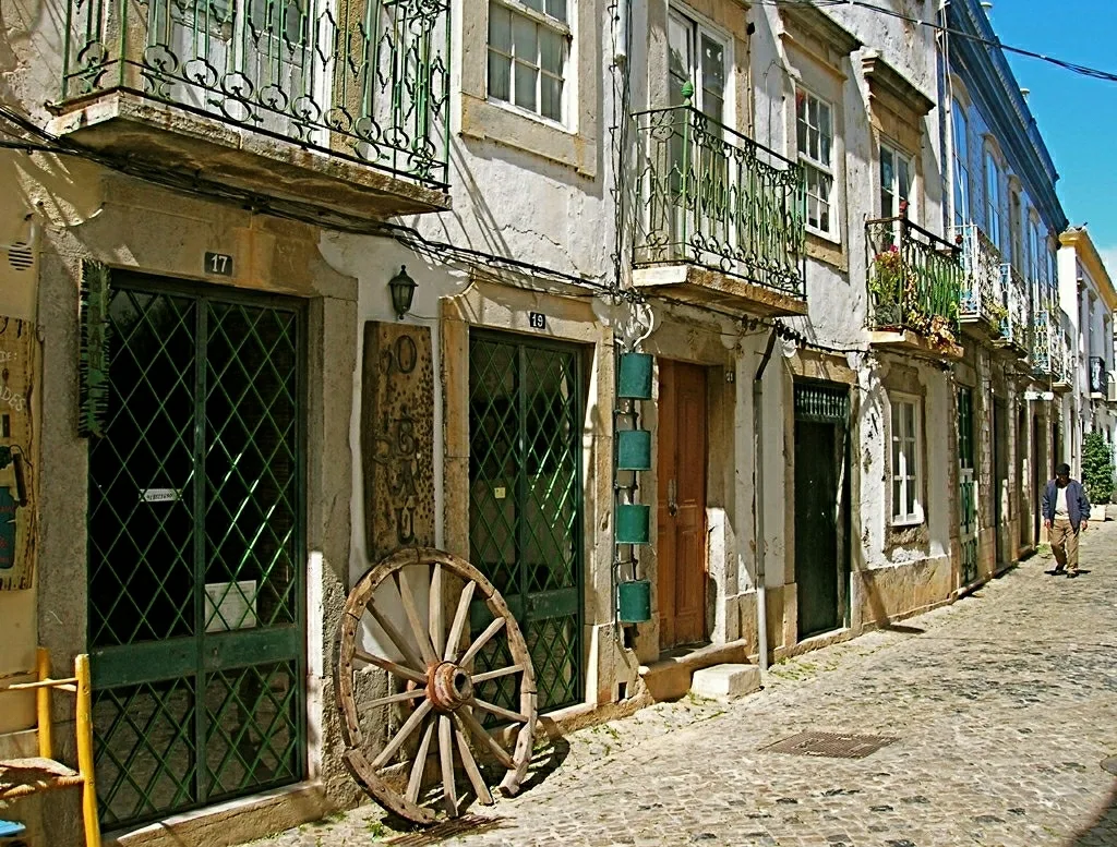 An antique shop on a cobbled street in Tavira.