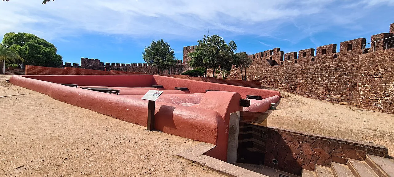 The red battlements inside Silves Castle.