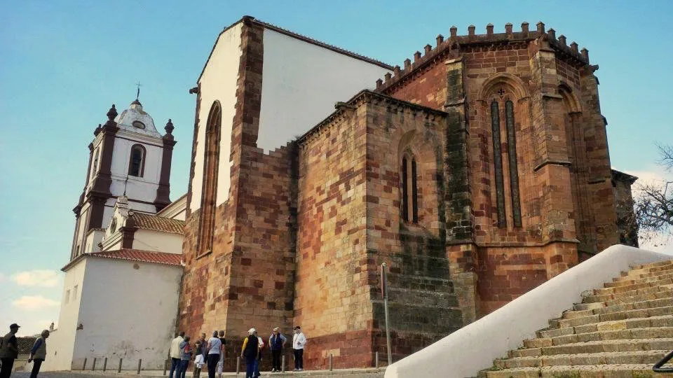 The red sandstone exterior of the Sé Catedral de Silves.