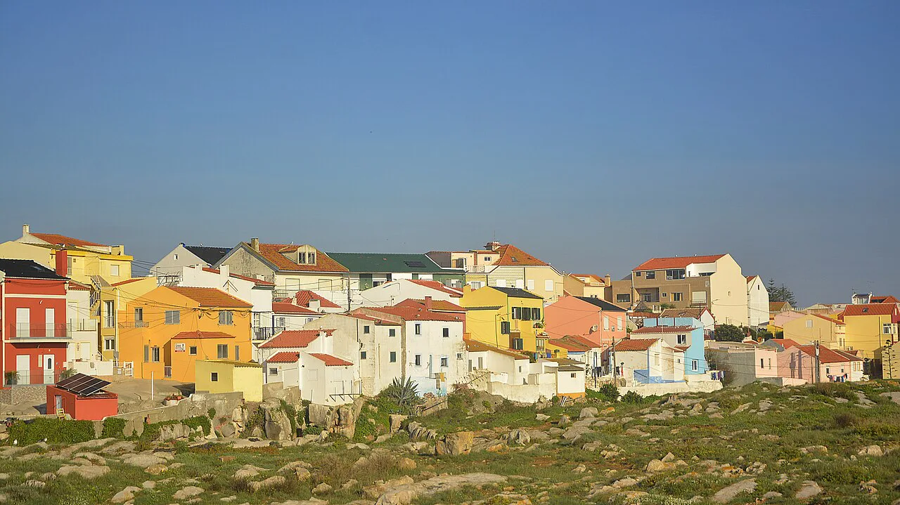 Colourful houses on the clifftop edge of Peniche.
