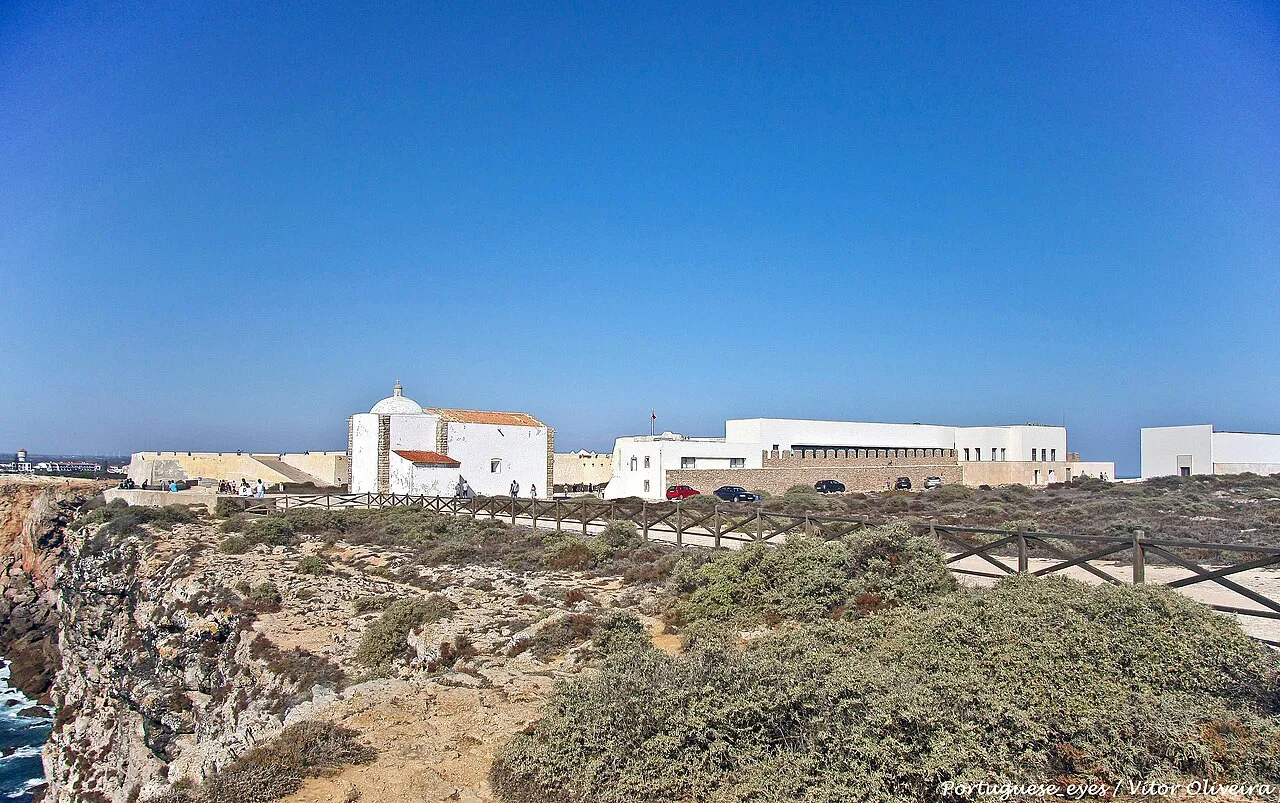 Buildings of the Fortaleza de Sagres on the clifftop above the Atlantic.