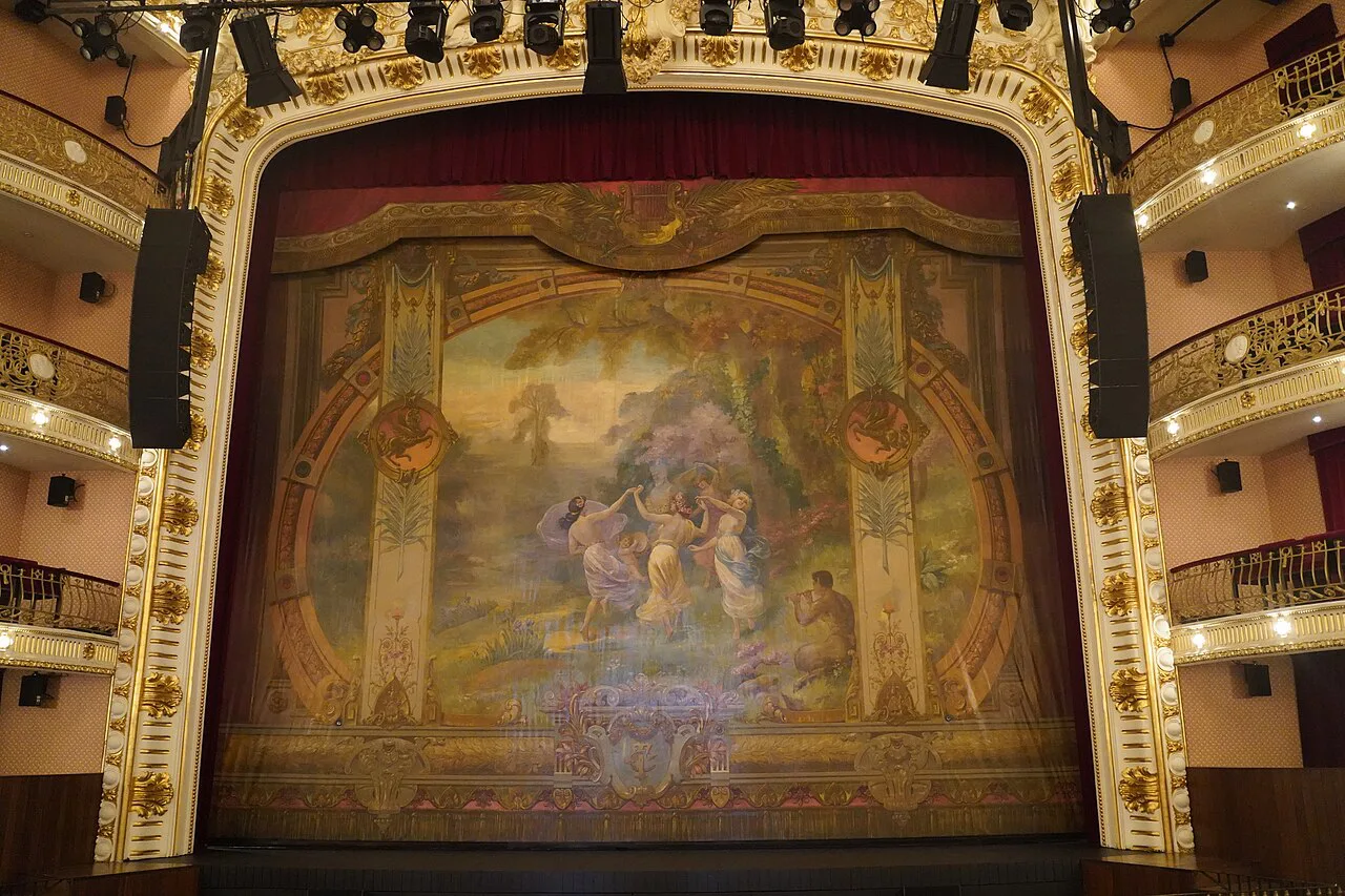 The stage and painted curtain inside the Theatro Circo in Braga.