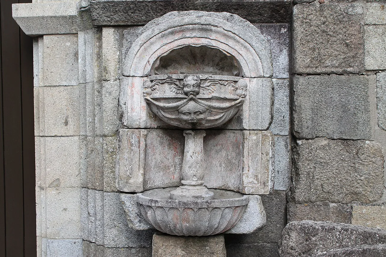 A stone fountain in the cloister of Saint Amaro at Braga Cathedral.
