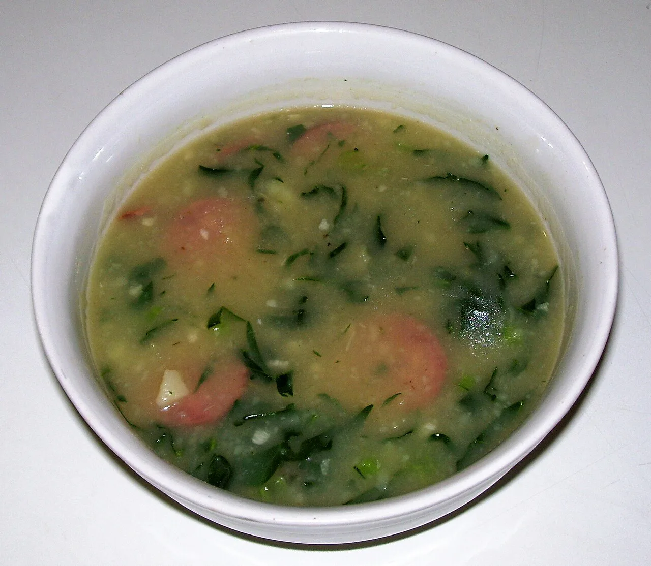 A bowl of caldo verde, a traditional Portuguese soup.